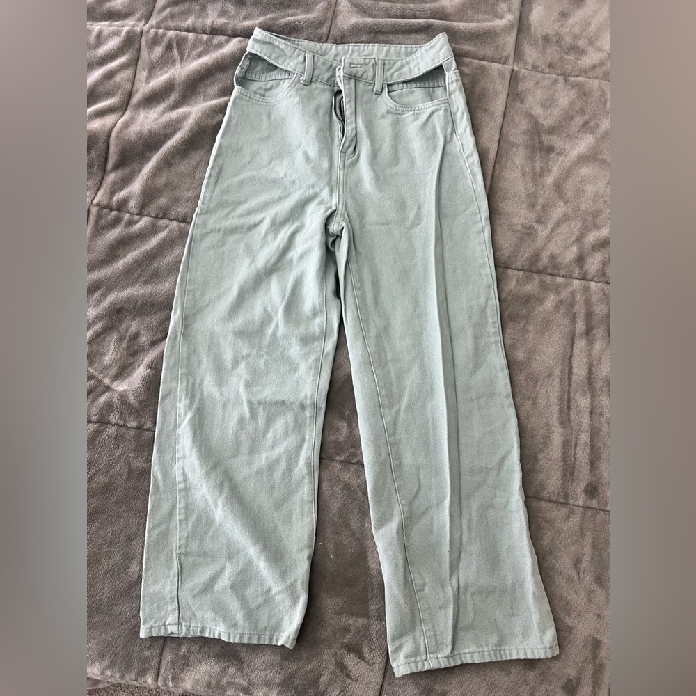 Size small light blue jeans with cutouts